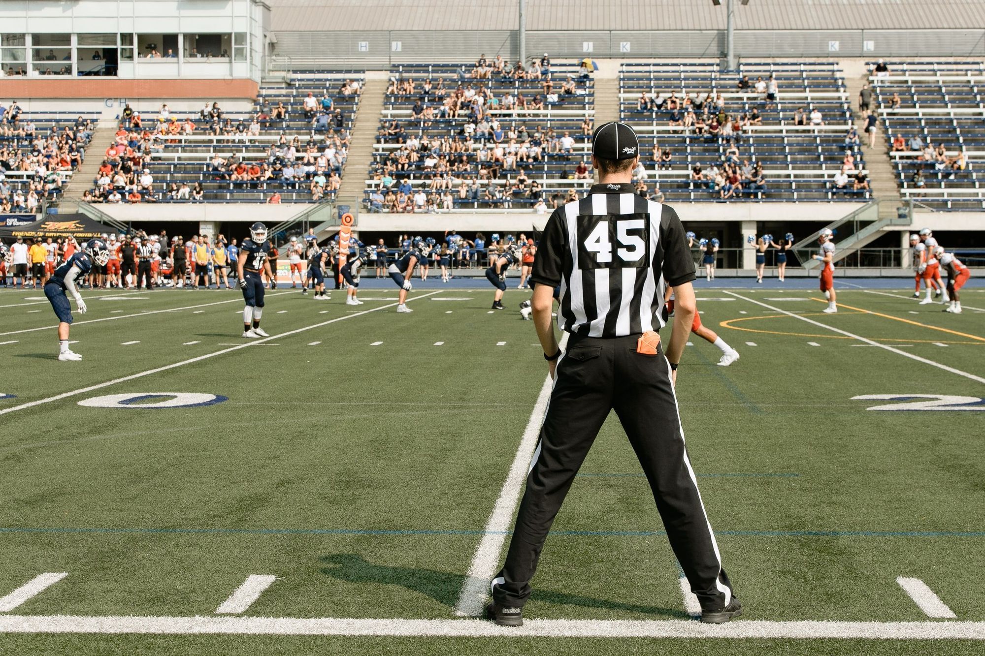 A referee standing on the field during an American football game in Toronto